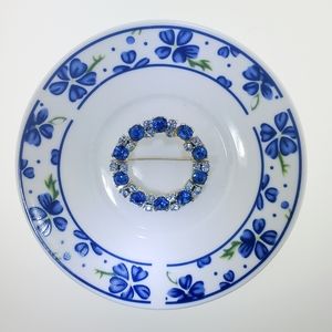 Vintage dazzling blue crystal lapel pin brooch